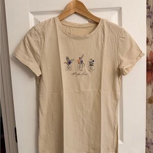 Beige Graphic T-Shirt with Floral Design